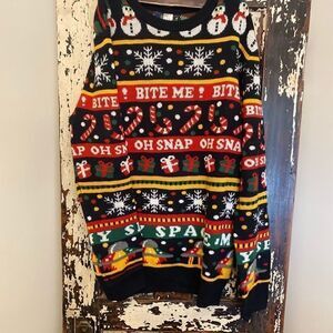 NWOT Bite Me! oh Snap! Spaceman Christmas holiday sweater.